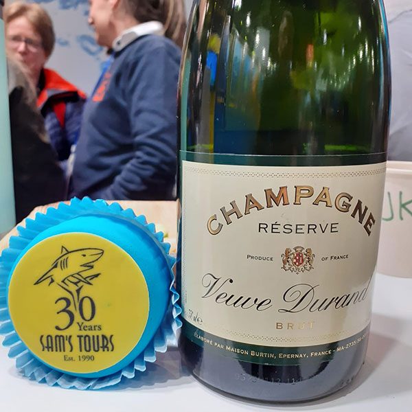 Cake-Champagne-boot-2020 Logo anniversary cake and champagne